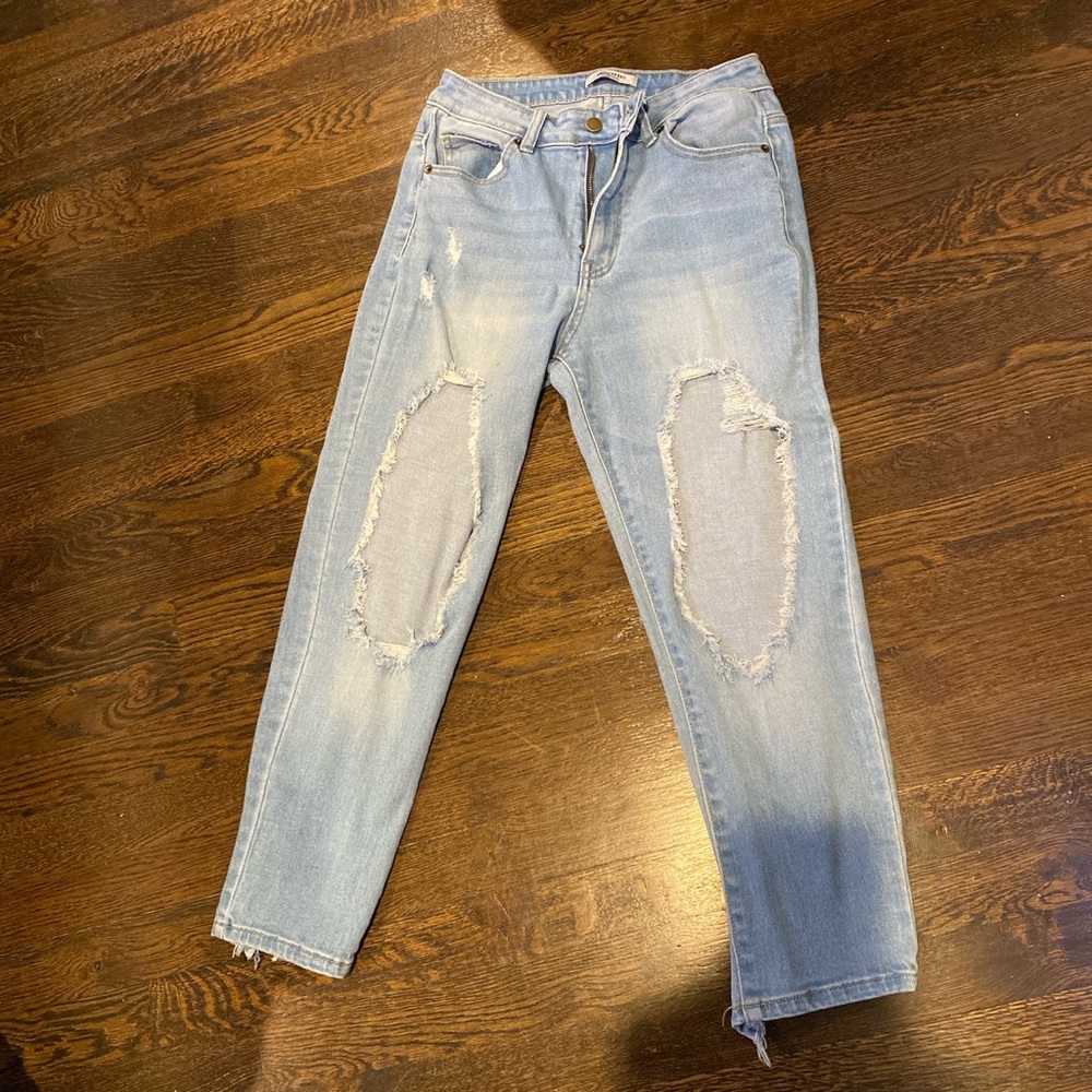 light denim jeans w 2 big holes